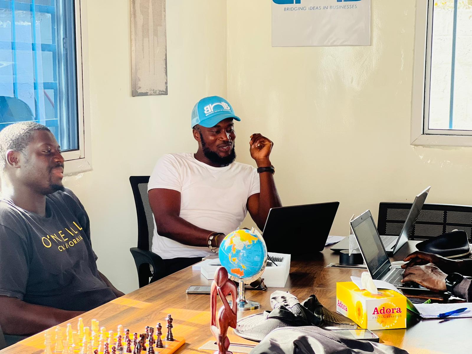 M.Savage Group team members collaborating in the office